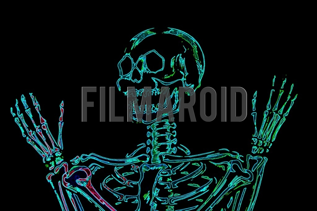 Medium shot of a human skull with expressive hands and a colorful neon effect against a pitch black background