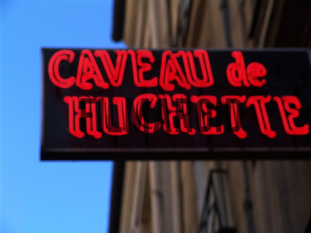Detail shot of the neon sign of this mythic Jazz club in Paris